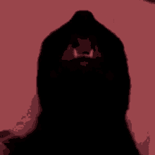 a close up of a person 's face with their mouth open