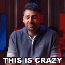a man wearing a hollister hoodie says this is crazy