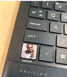 a pavilion keyboard with a picture of a man on it