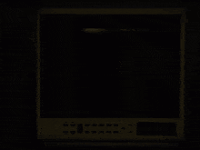 a blue light is coming out of a tv screen
