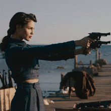 Blowing Smoke Gesture The Ministry Of Ungentlemanly Warfare GIF - Blowing Smoke Gesture The Ministry Of Ungentlemanly Warfare Dual Wielding Revolvers GIFs