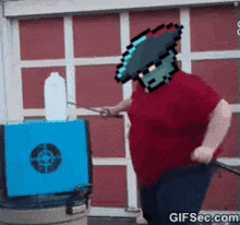 a pixelated man in a red shirt is standing in front of a blue box with a target on it