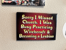 a sign on a wall that says sorry i missed church i was busy practicing witchcraft & becoming a lesbian