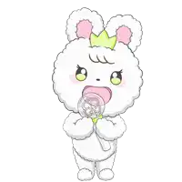 a white teddy bear with a green crown on its head