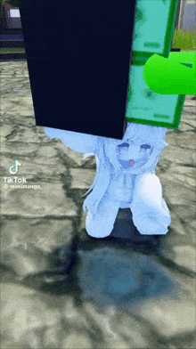 a girl in a white outfit is holding a black box over her head