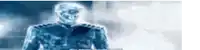 a blurred image of a man in a blue suit with a skull on his face .
