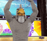 a man in a bird costume holds his arms in the air in front of a screen that says friday