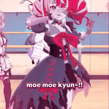a girl in a dress is dancing in a dance studio and says moe moe kyun .