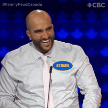 Laughing Hysterically Ayman GIF - Laughing Hysterically Ayman Family Feud Canada GIFs