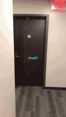 a door with a sticker on it that says " smash "