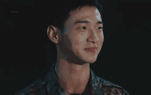 a close up of a man in a military uniform with the word talkme visible on the bottom right