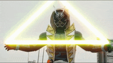 a person in a costume with a triangle on their chest is holding a yellow light