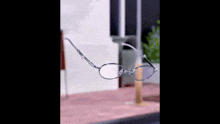 a pair of glasses floating in the air