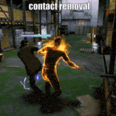 a video game is being played in a warehouse and the player 's name is jin kuwana