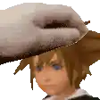 a close up of a person 's head with a white object on it .