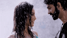 a man and a woman are looking into each other 's eyes in the rain