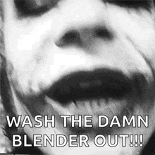 a black and white photo of a woman 's face with the words `` wash the damn blender out ! ''