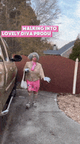 a woman in a wig and shorts is walking into a lovely diva product