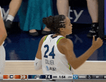 a female basketball player with the number 24 on her back