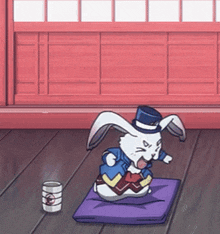 a cartoon rabbit wearing a top hat is sitting on a purple cushion