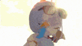 a cartoon girl wearing sunglasses and a hat is holding a duck in her hand .