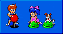 a boy and a girl are playing with a bowling ball and a cat