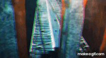 a gif of a roller coaster with the words make a gif.com on the bottom