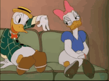 Donald Duck Making A Classic Move GIF - Couch Donald Duck Date GIFs