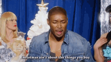 Christmas Its Not About The Things You Buy GIF - Christmas Its Not About The Things You Buy Baby Yeezus GIFs