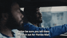 two men are in a car and one of them says better be sure you tell them to watch out for florida man
