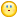 a pixelated smiley face with tears coming out of it 's eyes .