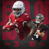 a football player wearing a helmet that says atl
