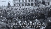 a black and white photo of a military parade with the words " the heart 's uneasy in the chest "