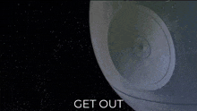 a green laser is coming out of the death star and the words get out are below it