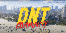 an advertisement for the dnt community shows a beach and a city in the background