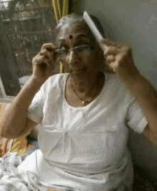 Old Woman Combing GIF