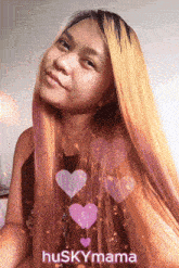 a picture of a woman with hearts and the name huskymama on the bottom