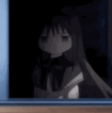 a cartoon character is looking out of a window at night .