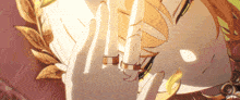 a girl with a laurel wreath on her head is wearing a wedding ring on her finger