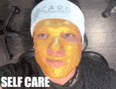 a person with a mask on their face and the words self care below