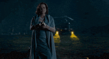 a person is walking up a set of stairs in the dark