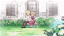 a boy and girl sit on a bench in front of a building