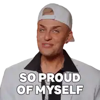 a man wearing a white baseball cap and a suit says so proud of myself