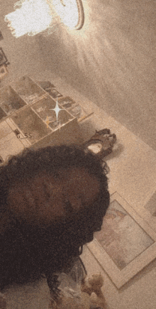 a person taking a selfie with the time of 6:55 on the bottom