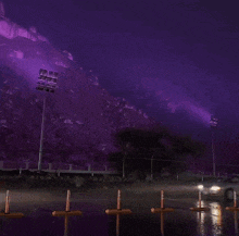 a purple sky with a lot of lights on