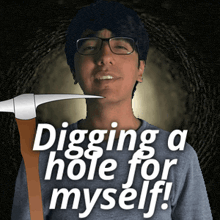 a man is digging a hole for myself with a pickaxe