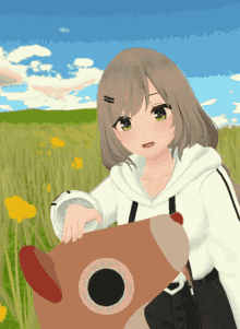 a girl holding a stuffed animal in a field with flowers