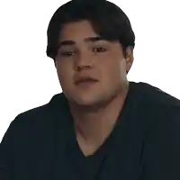 a man with his eyes closed and his mouth open