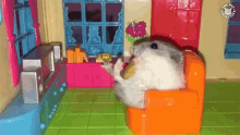 Chilling Hamster Eating Hamster GIF