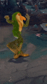 a painting of a monkey with a green cape on